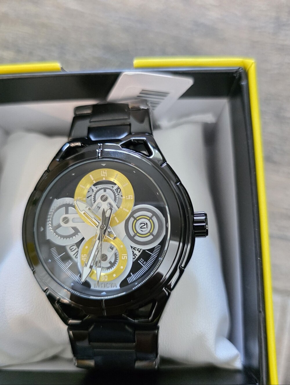 40. Invicta Men's Black and Yellow Watch
